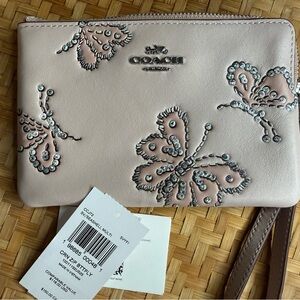 Coach NWT corner zip wristlet sparkly butterfly print seashell pink leather